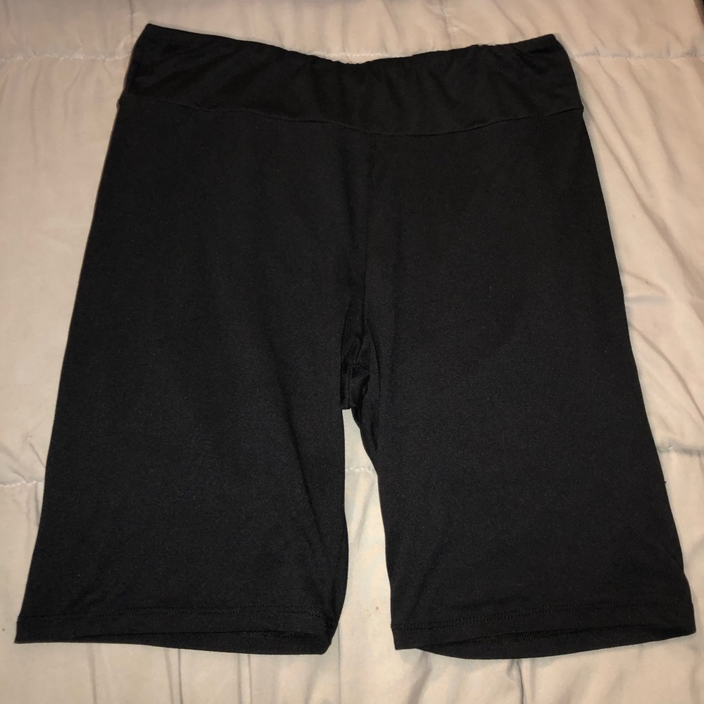 This is a black pair of large biker shorts.